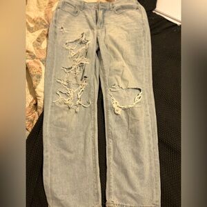 American Eagle light blue distressed straight jeans .   4